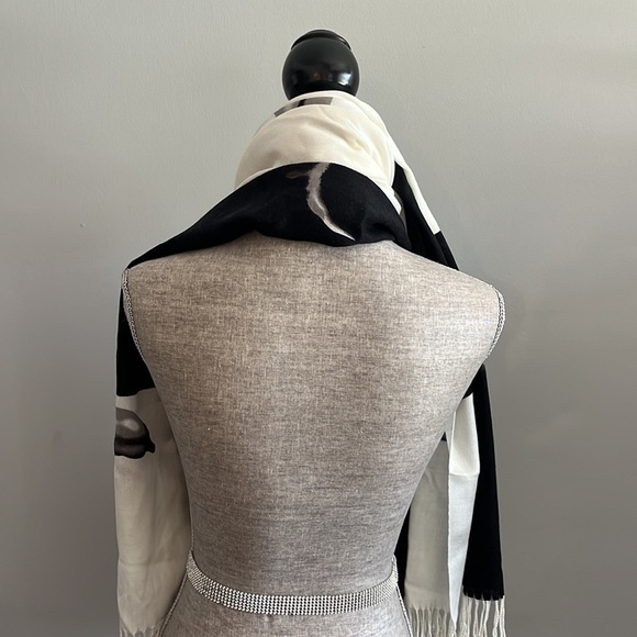Lightweight scarf/wrap.  Cream and black with floral details.  Fringe on the end - Picture 5 of 5